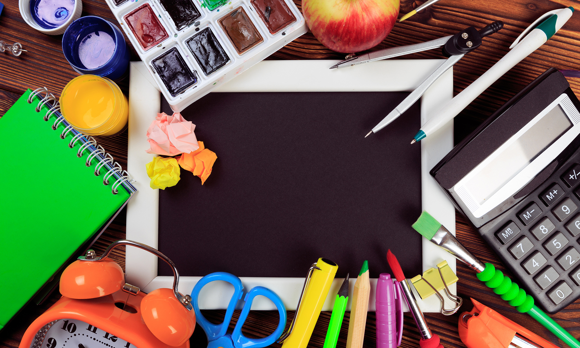 Back to School background concept. School supplies on a wooden backgroun